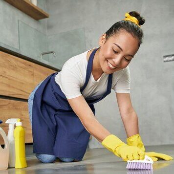 cropped-cropped-clean-it-up-full-length-shot-joyful-young-woman-smiling-while-cleaning-floor-with-detergents-home-housework-housekeeping-cleaning-service-concept-low-angle-view_386167-1553.jpeg